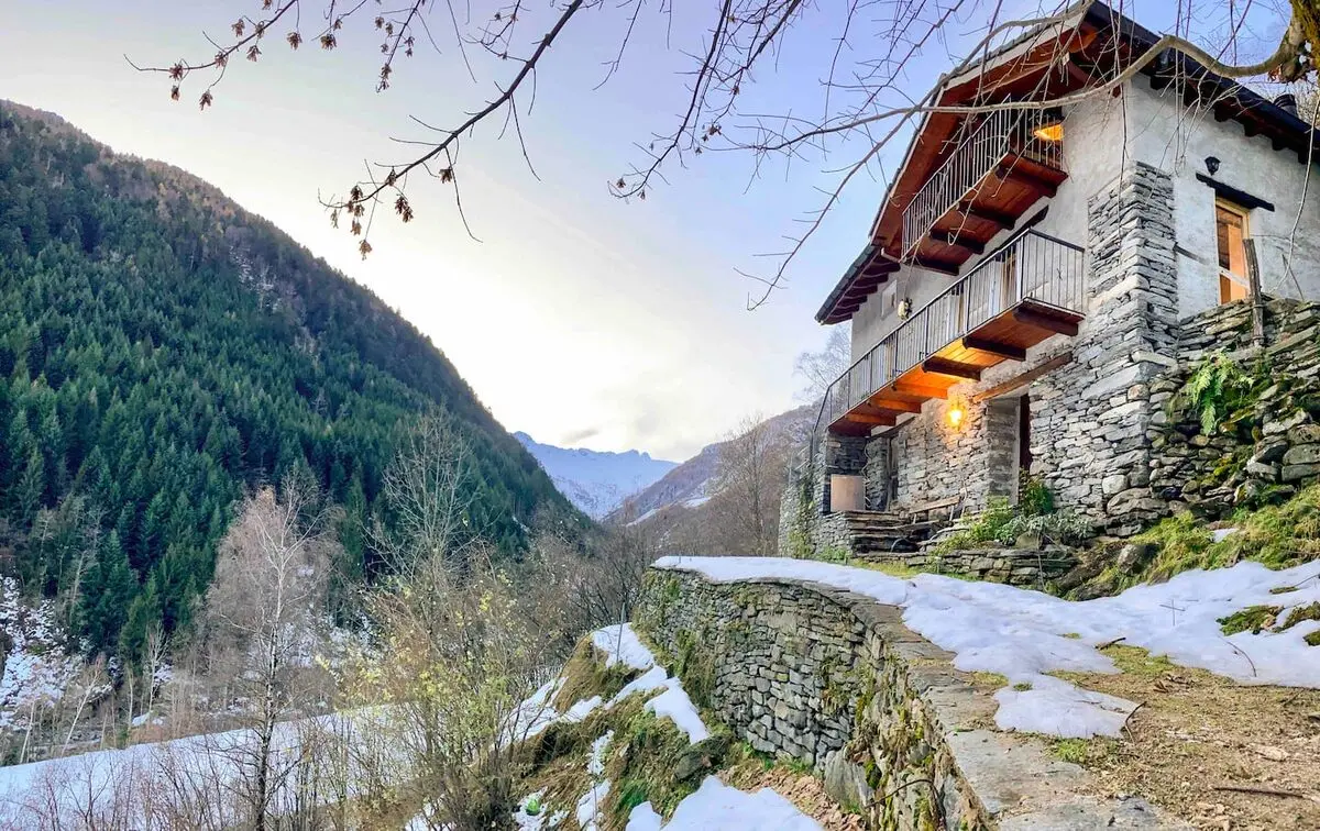 Vergeletto stone lodge overlooking the mountain valley