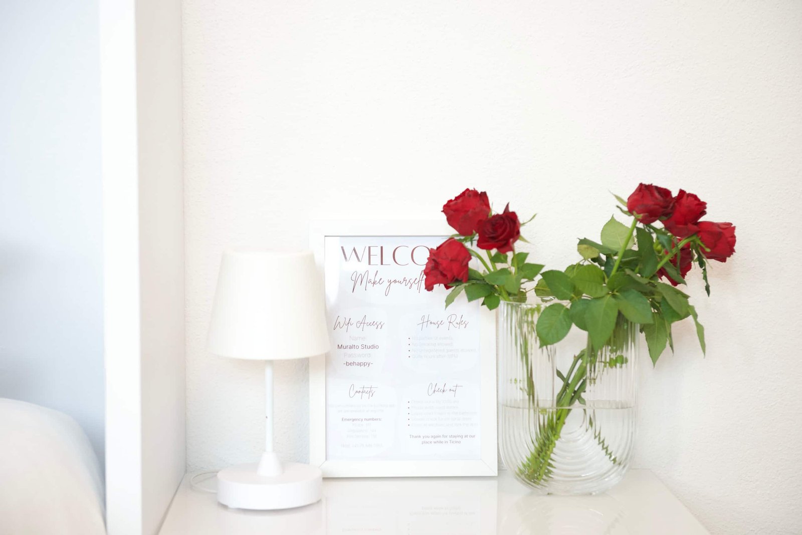 A note and fresh roses are waiting when you open the door.