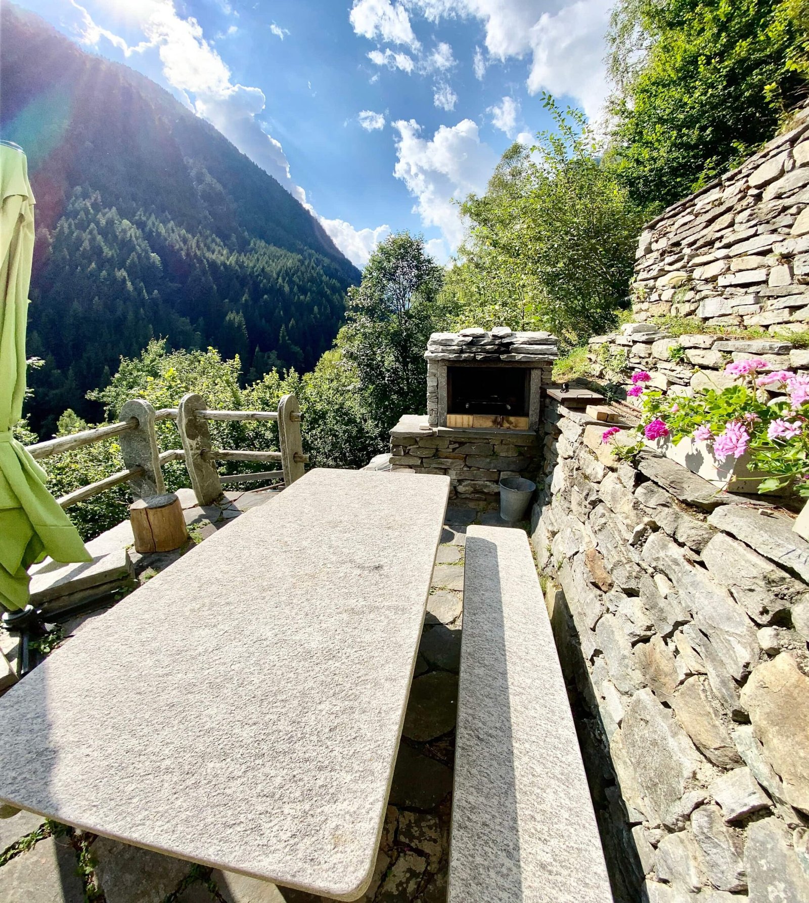 Eat at the granite table with the whole valley in front of you.
